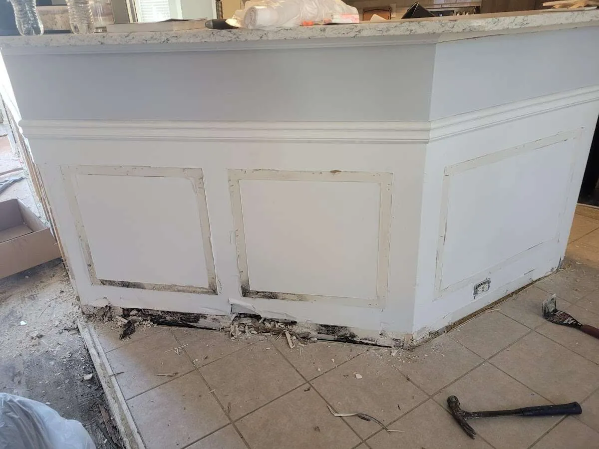 Water damage and mold on kitchen during Storm Damage Restoration in Atlantic